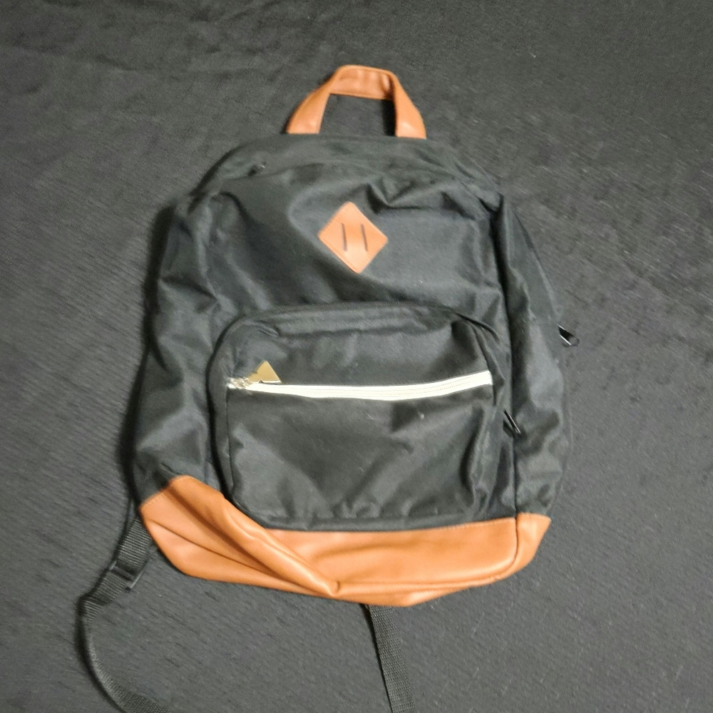Black and tan backpack